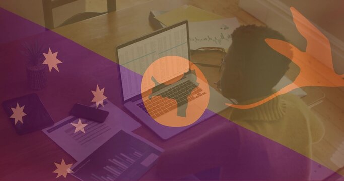 Using woman in sweater reviewing laptop spreadsheet at home table with kangaroo overlay, copy space