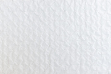 Elegant white paper abstract background with ornamental patterns. Subtle decorative texture, perfect for invitations, greeting cards, wedding stationery, or luxury packaging design. Minimalistic.