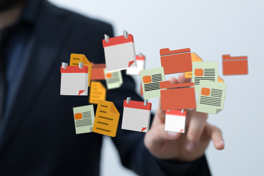 Business person touching digital data with folders and calendar floating in the air
