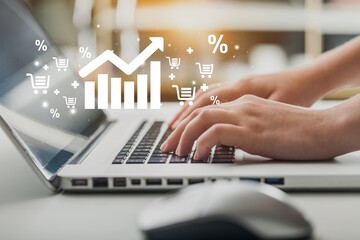 Sale growth. Businessman with graph and shopping cart