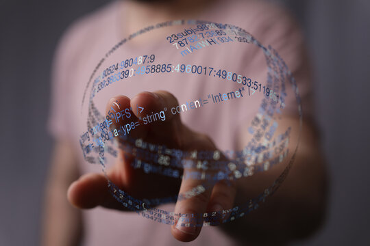 Abstract image of a hand holding a digital globe with data, representing the internet, technology, and connection. Perfect for concep