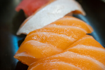 Close up of Traditional Japanese Sushi nigiri with Salmon and Tuna