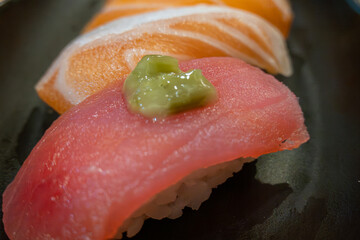 Close up of Traditional Japanese Sushi nigiri with Salmon and Tuna
