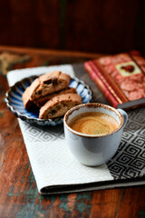 Cup of coffee on rustic wooden background. Soft focus. Copy space	