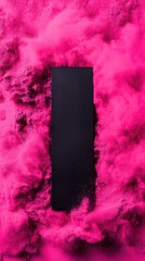 Black rectangular shape surrounded by vibrant pink powder explosion
