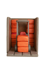 Forklift carrying stacked orange packages in industrial clay scene with detailed texture and warm tones