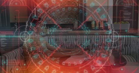 Adult woman typing on laptop as HUD overlay drifts in, highlighting data for technology demo