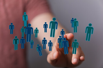 Hand interacting with digital people icons, teamwork concept, connection, networking, social media, human resou