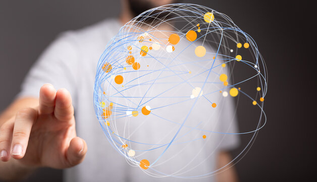 Close up of person touching a digital globe representing global networking, communication, and connectivity. Symbolizing concepts of - Powered by Adobe