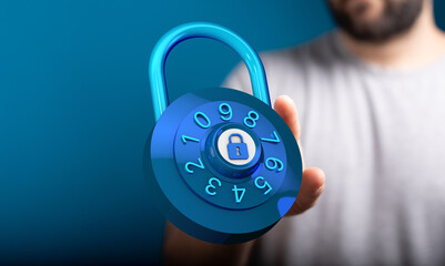 Concept of cybersecurity and protection from online threats. Person holding a blue padlock. Secure access, data