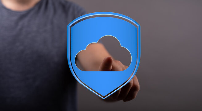 Secure cloud computing concept: A hand touches a digital cloud shield, symbolizing data protection and security