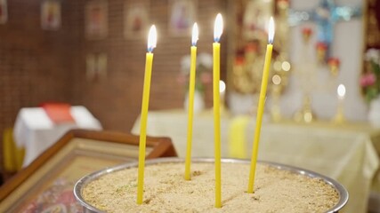 gentle glow enhances spiritual ambiance, serene scene of prayer candles illuminating sacred space - Powered by Adobe