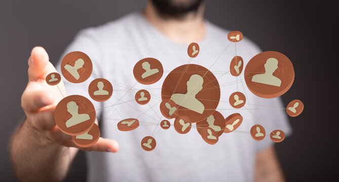 Conceptual photo depicting a man interacting with a digital network representing social connections and data in a virtual metaverse environment. - Powered by Adobe