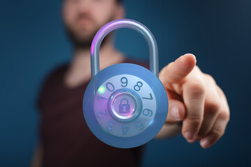 A person touching a glowing padlock representing digital security, data privacy, and protection. Concept of cybersecurity, encryption