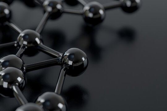 Shiny black molecular structure forming complex connections on a dark background, representing scientific research and nanotechnology