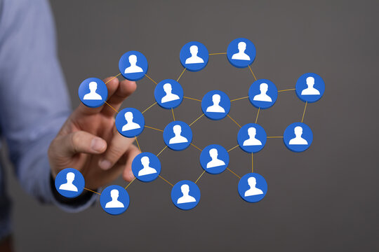 Hand touching digital network of people. Communication, global connectivity, technology and community.