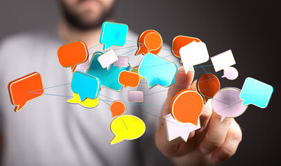 Man touching digital speech bubbles, symbolizing online communication, social networking, and global connection
