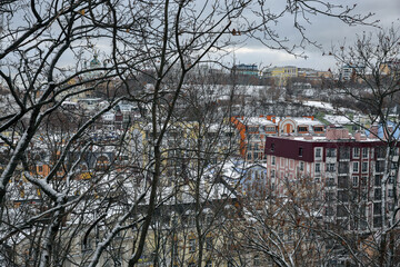 Winter view of colorful buildings in Podil district, Kyiv, Ukraine.