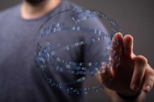 Abstract image of a hand interacting with a holographic data visualization, representing digital transformation, innovation and data - Powered by Adobe