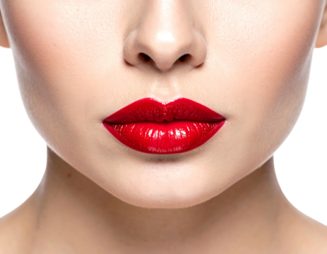 Close-up of a fair-skinned person's face focusing on the red lipstick-covered lips. The nose, and cheeks are visible