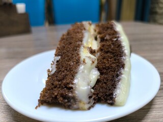 delicious piece of chocolate cake on a plate.