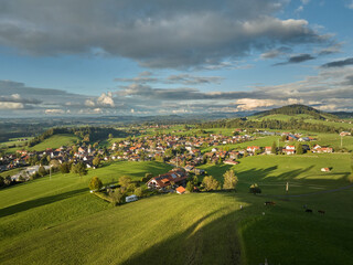 Aerial photo at sunset of the village of Weiler-Simmerberg, district Simmerberg in the western Allgaeu in Bavaria, Germany
