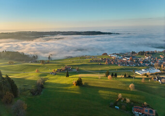 Aerial photo at sunset of the village of Weiler-Simmerberg, district Simmerberg in the western Allgaeu in Bavaria, Germany