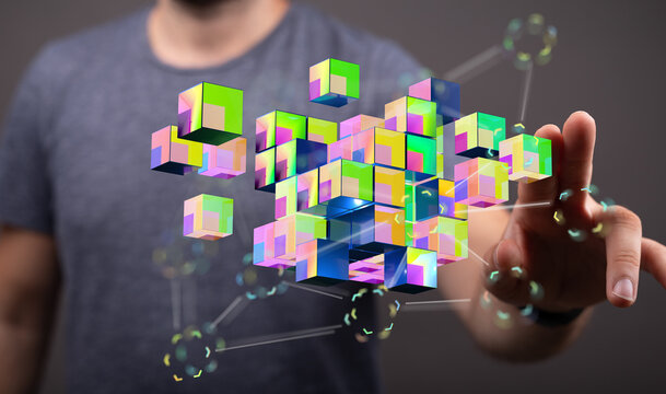 Man touching holographic cubes, concept of technology, data, connection, innovation, and futuristic digital wor - Powered by Adobe