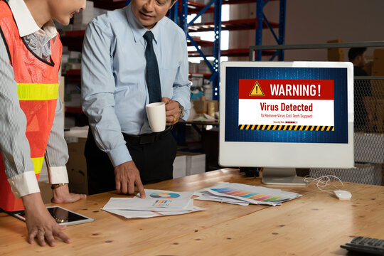 Virus warning alert on computer screen detected modish cyber threat , hacker, computer virus and malware