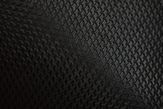 Close-Up of Carbon Fiber Texture with Intricate Geometric Pattern for Modern Design