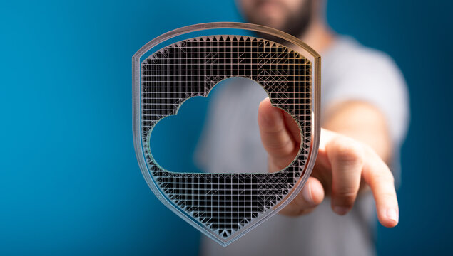 Abstract image of a person touching a digital shield with cloud symbol, represents data security and protection