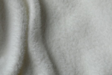 Top view of white cashmere fabric background