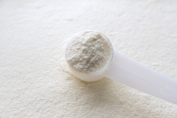 Powdered milk with spoon for baby