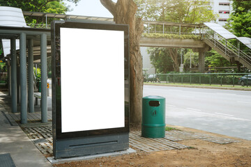 Blank white mock up of vertical light box billboard at bus stop station