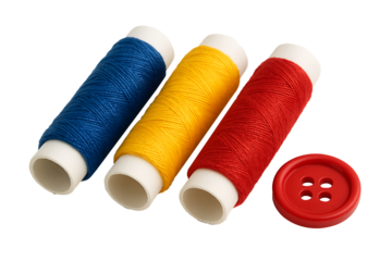 Colorful sewing threads and button arranged on clean background showcasing vibrant textile materials, crafting accessories, garment repair essentials and creative hobby tools for fabric work 