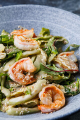 Shrimp Salad with Fresh Herbs on a Gray Plate