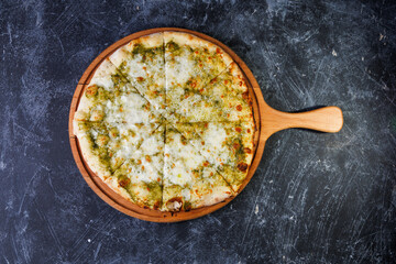 White four cheeses pizza with melted parmesan, gorgonzola, mozzarella and gouda cheese isolated. Traditional italian whole flatbread with 4 cheese