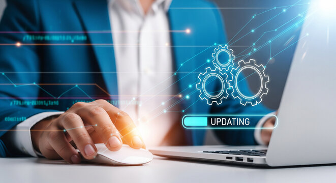 A person using a laptop with an updating progress bar and gears overlayed on the screen view