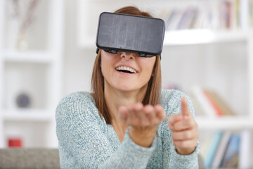 a woman wearing vr goggles
