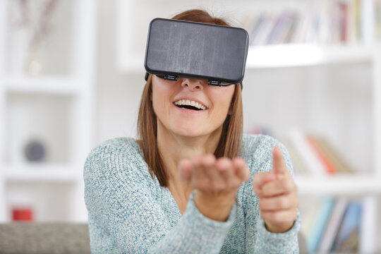 a woman wearing vr goggles