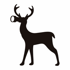 Silhouette of a standing deer holding an object in its mouth