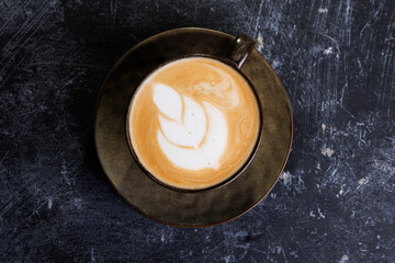 Rustic Ceramic Latte Cup With Rich Coffee And Leaf Latte Art