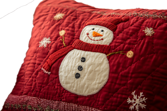 Quilted red Christmas cushion with snowman embroidery isolated on transparent background 