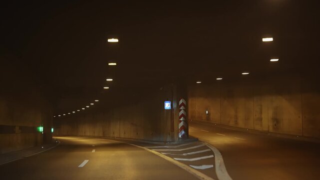 Drive pov in underground tunnel under Rhine promenade in Dusseldorf, Germany