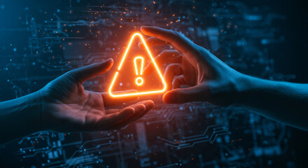 Two hands carefully hold a glowing orange warning triangle symbol, symbolizing digital risk and cybersecurity awareness in a futuristic tech environment.
