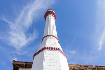 Islamic place of worship, mosque minaret, viewed from below upwards