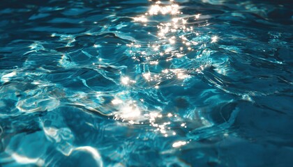 Naklejka premium Abstract Closeup Blur Of Surface Blue Water Reflecting Sunlight: Top View Of Splashing Water For Graphic Use.