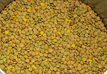 Raw organic green lentils pattern texture background