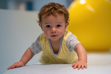Naklejka premium safe and engaging playground designed for infants featuring ageappropriate play elements that promote development