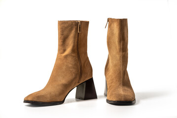Brown Female Suede Heeled Ankle Boots. Female Fashionable Footwear For Autumn Isolated On White Background. Clipping path included
